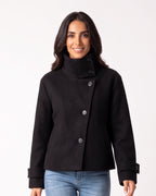 Cropped wool jacket, funnel neck, asymmetric buttons, tab cuffs, black