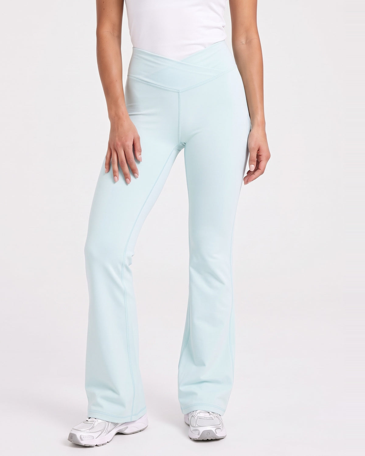 Light blue high-waisted V-crossover flare yoga leggings with bootcut fit