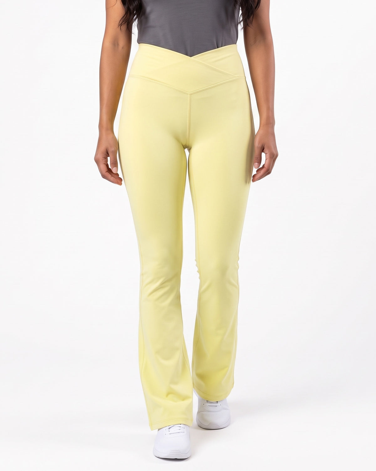 Light yellow high-waisted V-crossover flare yoga leggings with bootcut fit