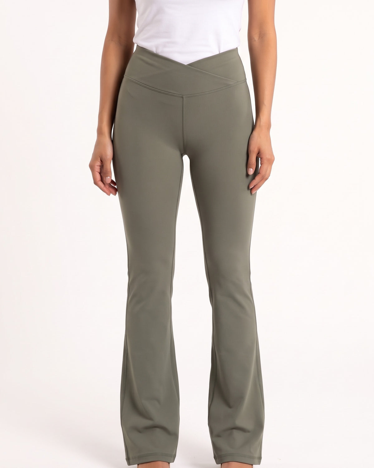 Olive high-waisted crossover flare yoga leggings with V-shaped seam detail.
