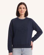 Women’s navy crewneck sweatshirt with embossed geometric logo and raglan sleeve seams