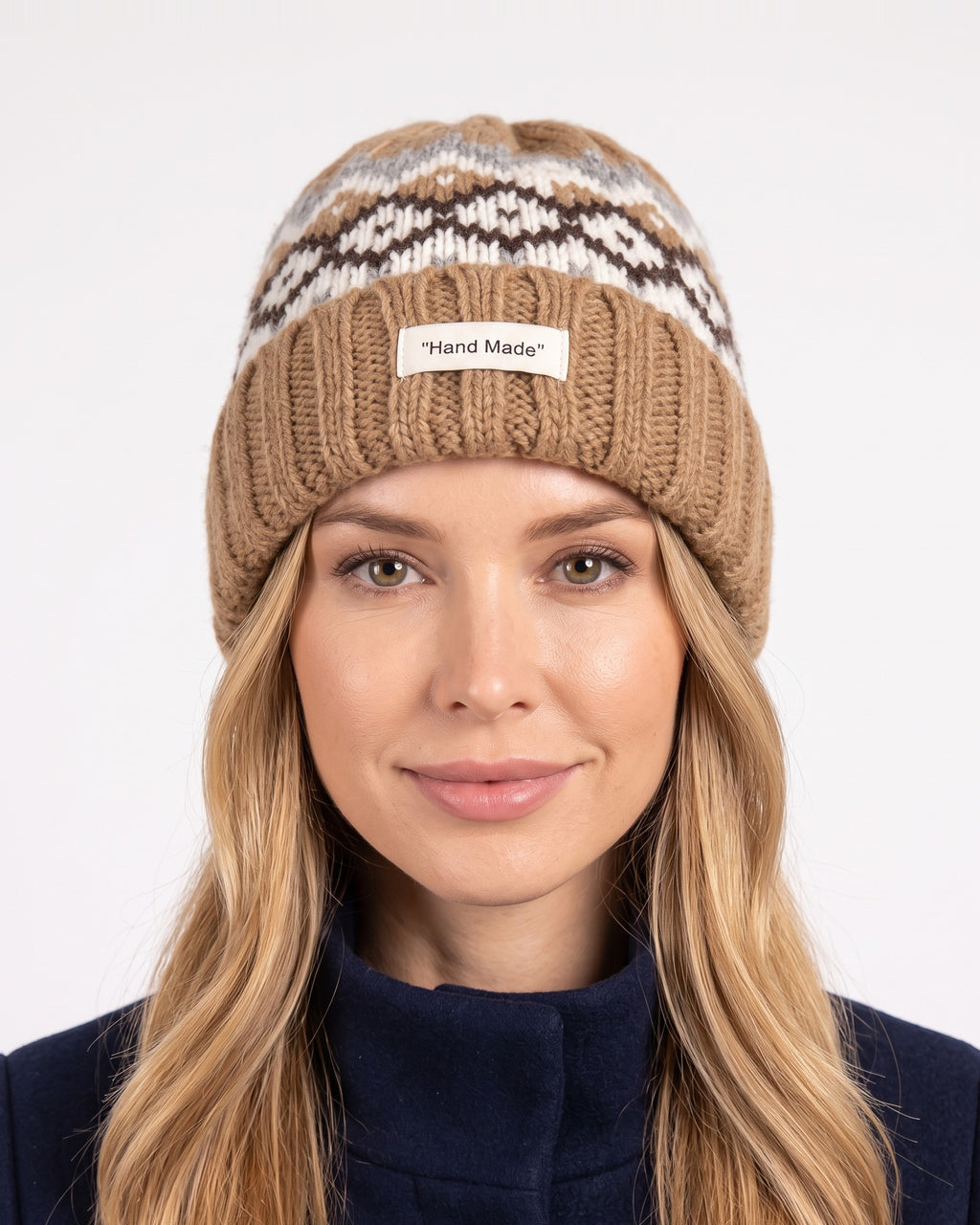 Women’s knit beanie with Fair Isle pattern and ribbed cuff, tan with white and dark brown motifs