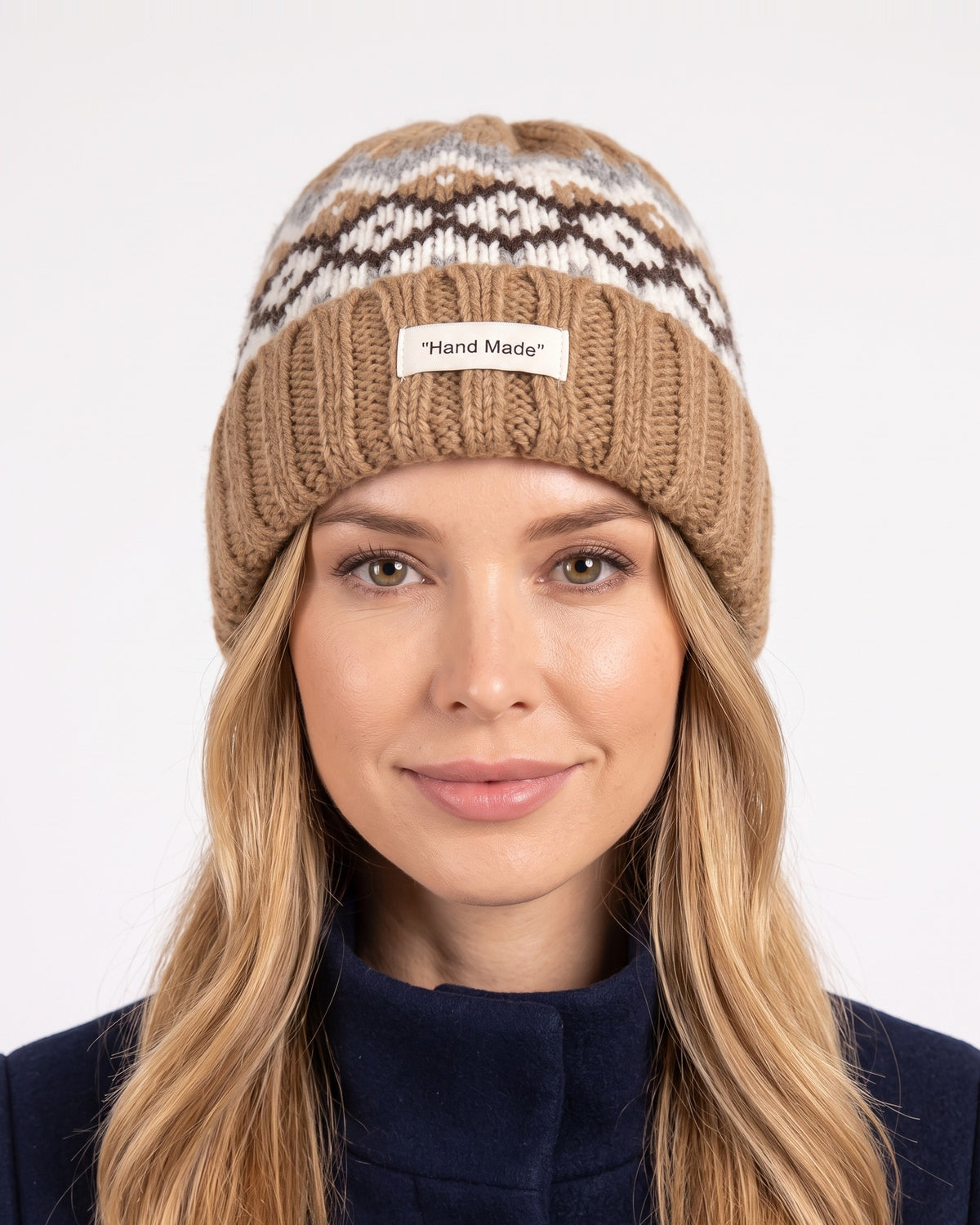 Women’s knit beanie with Fair Isle pattern and ribbed cuff, tan with white and dark brown motifs