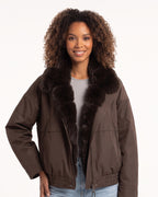 Women’s cropped bomber jacket in dark brown/black nylon with faux fur collar and zip front