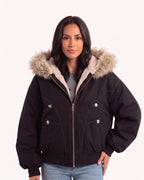Black faux fur hood bomber jacket with zip front, faux fur trim, and chest pocket flaps