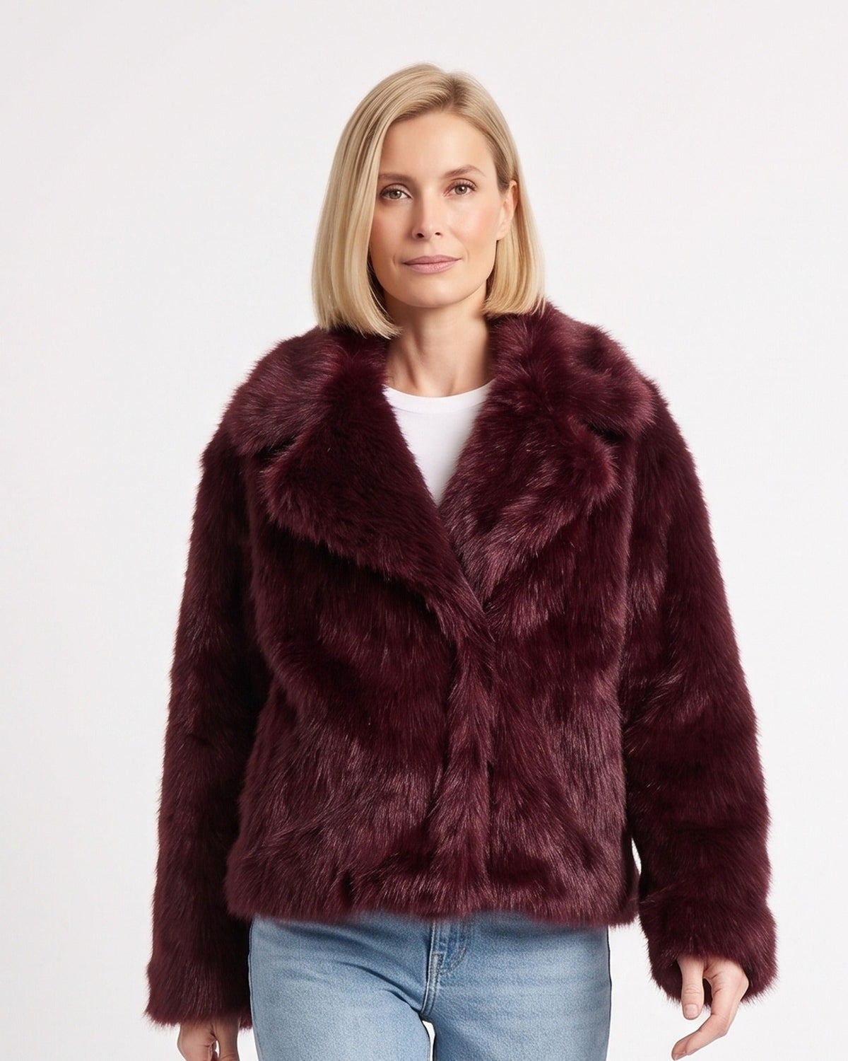 Burgundy shaggy faux fur short coat with wide lapel collar, model-worn front view