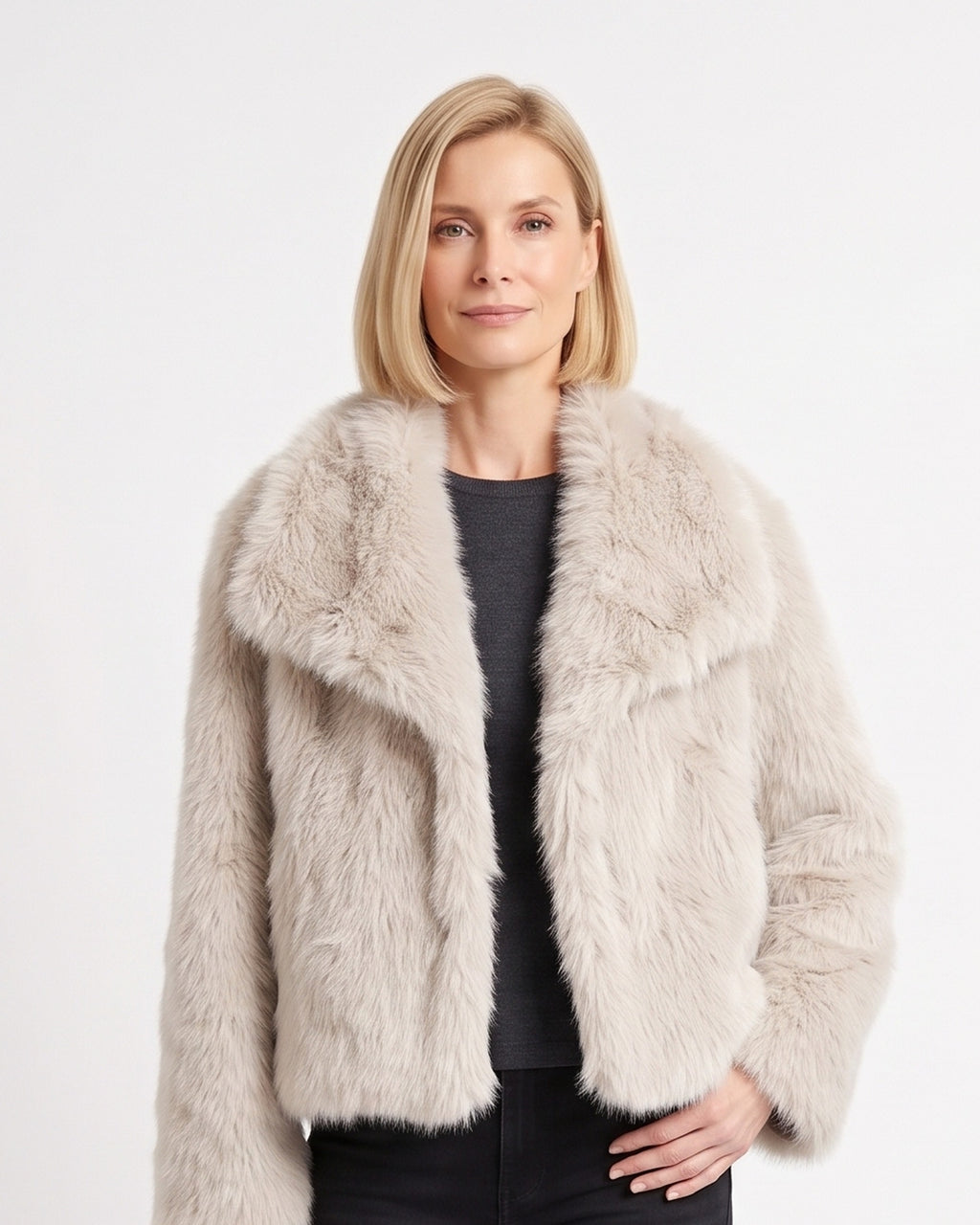 Beige faux fur jacket with an oversized collar and relaxed fit