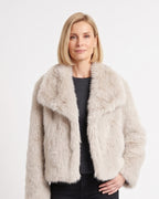 Beige faux fur jacket with an oversized collar and relaxed fit