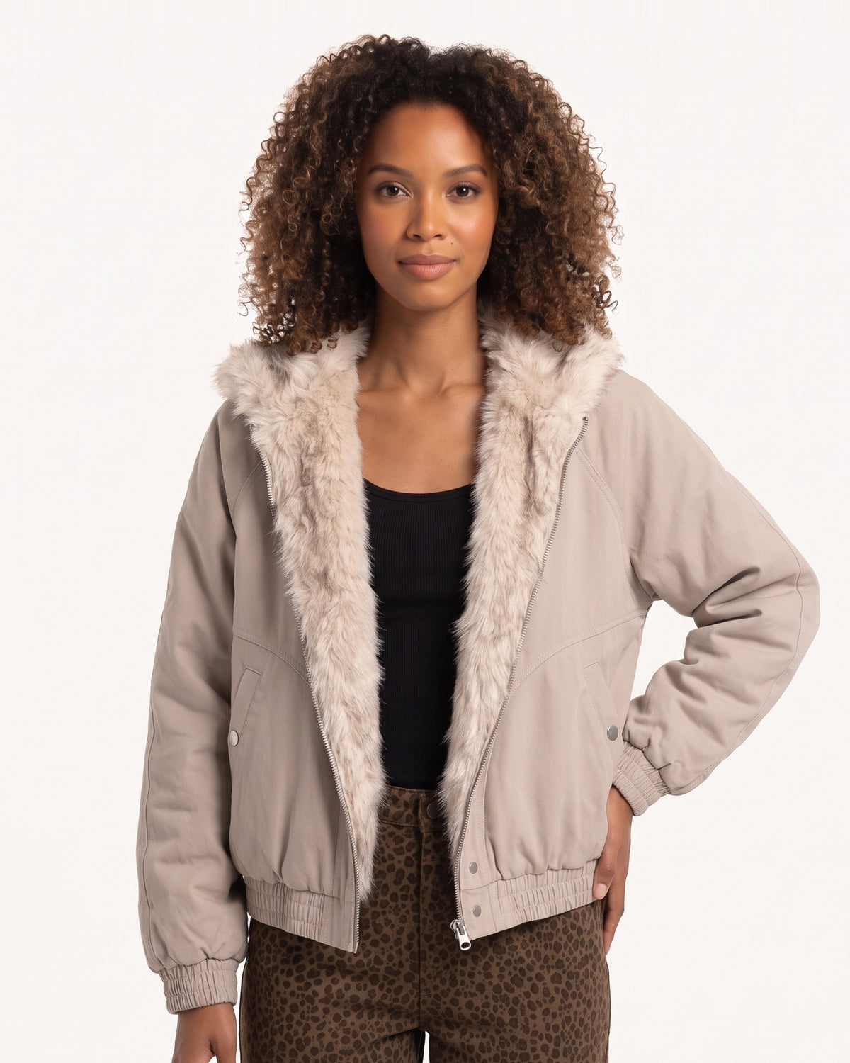 Women’s beige canvas bomber jacket with faux fur-lined collar and zip front