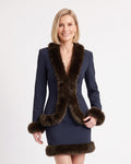 Fitted blazer and mini skirt set in navy with faux fur trim