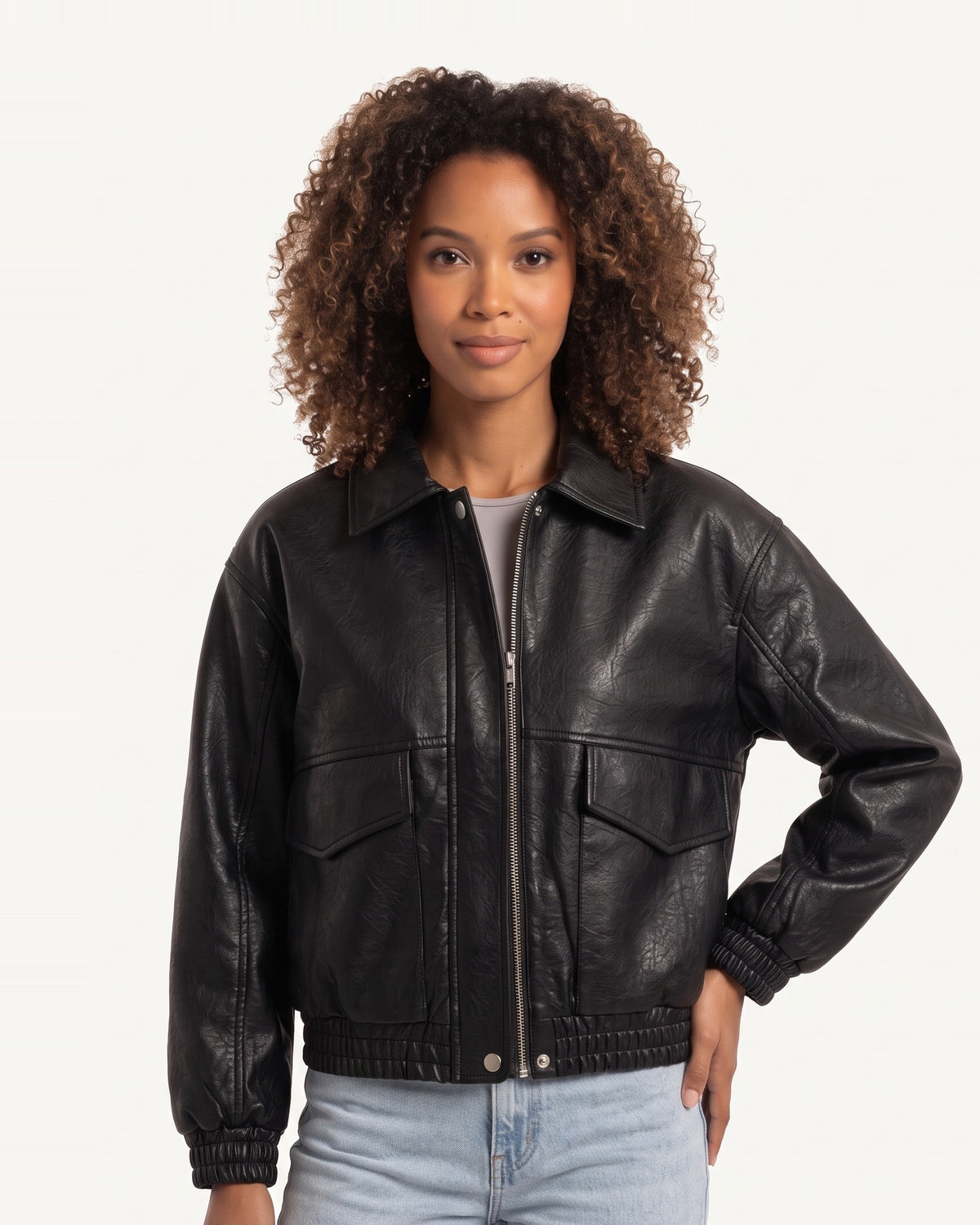 Black faux leather cropped bomber jacket with zip front and flap chest pockets