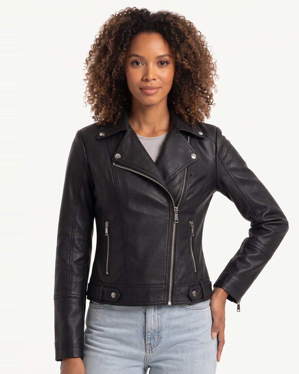 Black moto jacket on model, asymmetrical zip front, snap shoulder tabs, zip details.