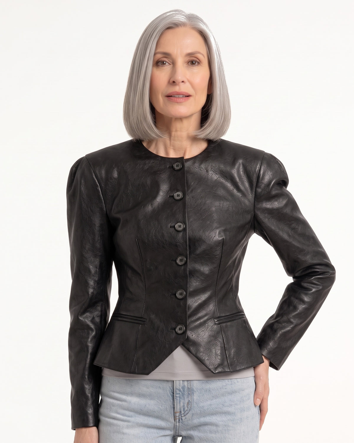 Black faux leather peplum blazer with button front, collarless neckline, structured shoulders