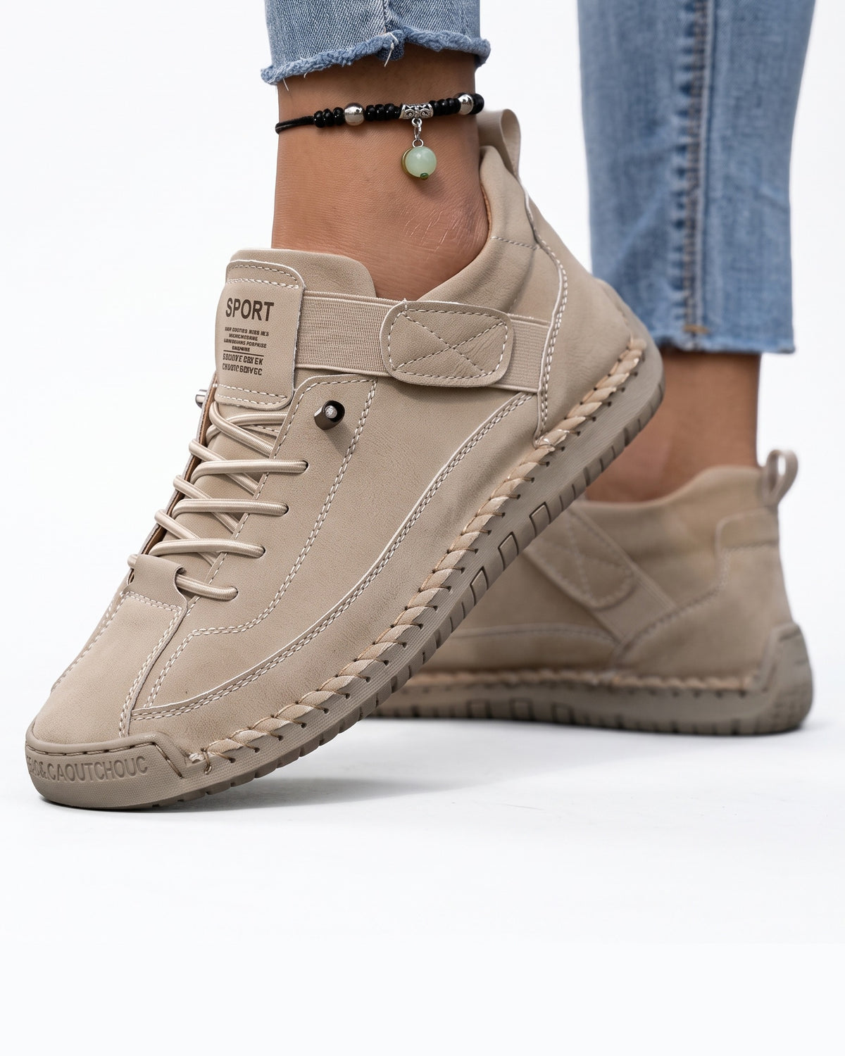 Beige faux leather lace-up sneaker with ankle strap and contrast stitching