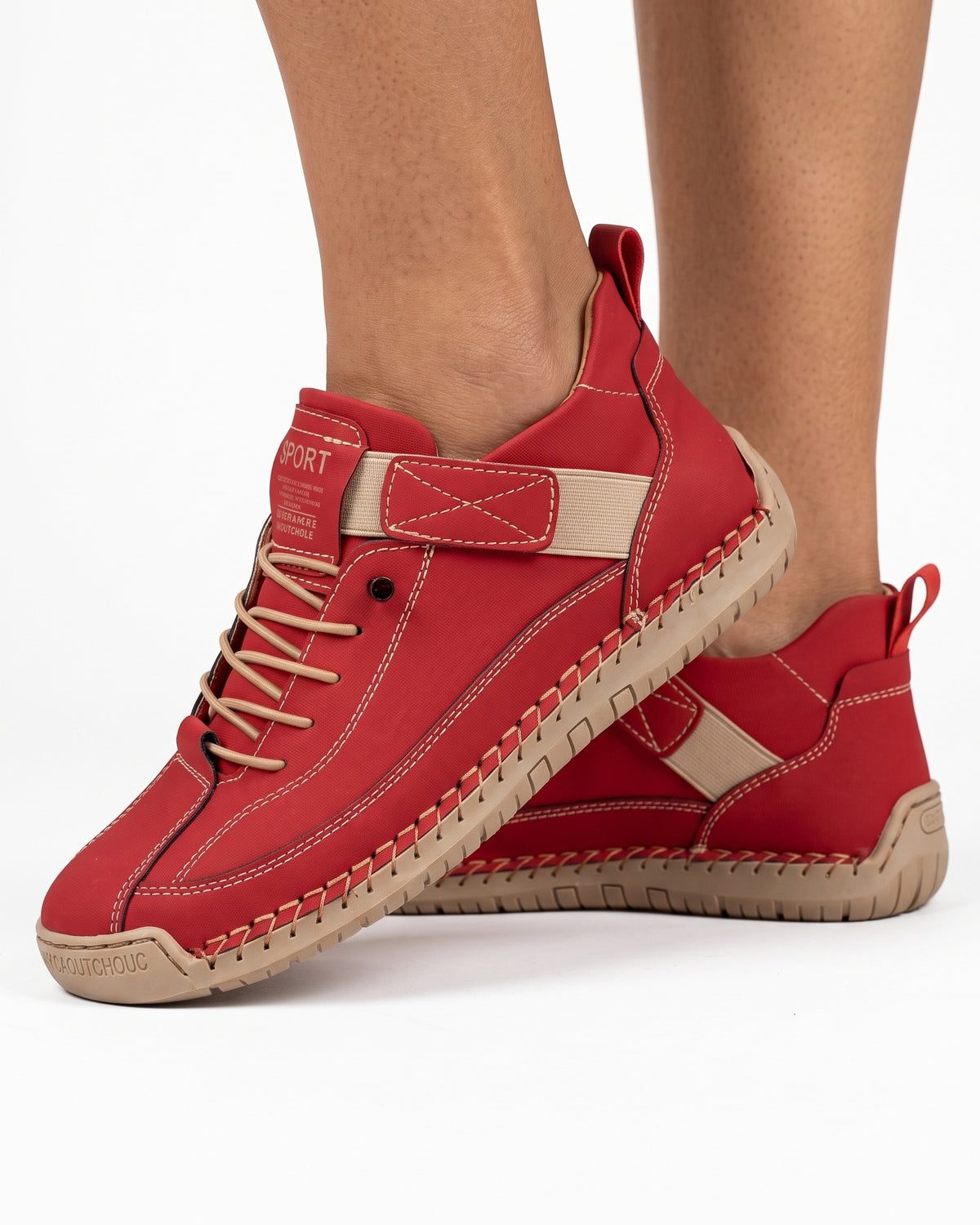 Red faux leather lace-up sneaker with ankle strap and thick textured sole
