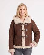 Women's brown faux suede shearling jacket with hood and sherpa trim, toggle duffle