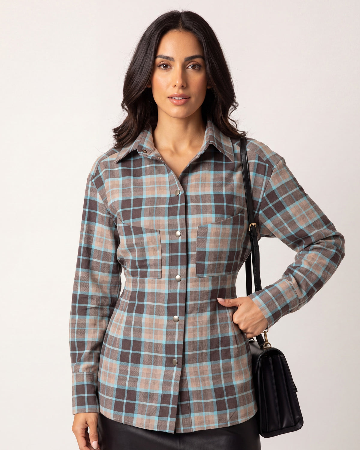 Blue plaid button-down shirt with chest pockets, front buttons, and long sleeves