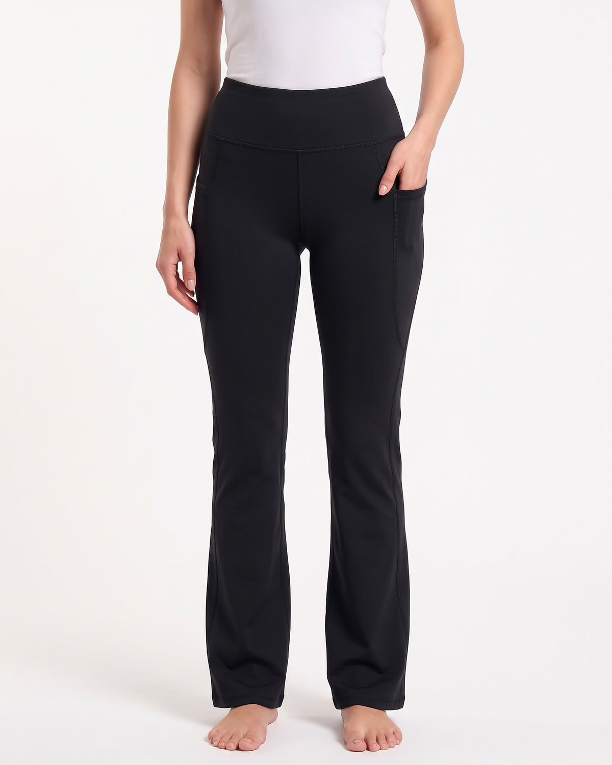 Black high-waisted bootcut yoga pants with side phone pocket, soft stretch fabric