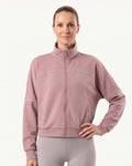 Women’s cropped fleece zip-up jacket with stand collar, mauve/pink with contrast seams.
