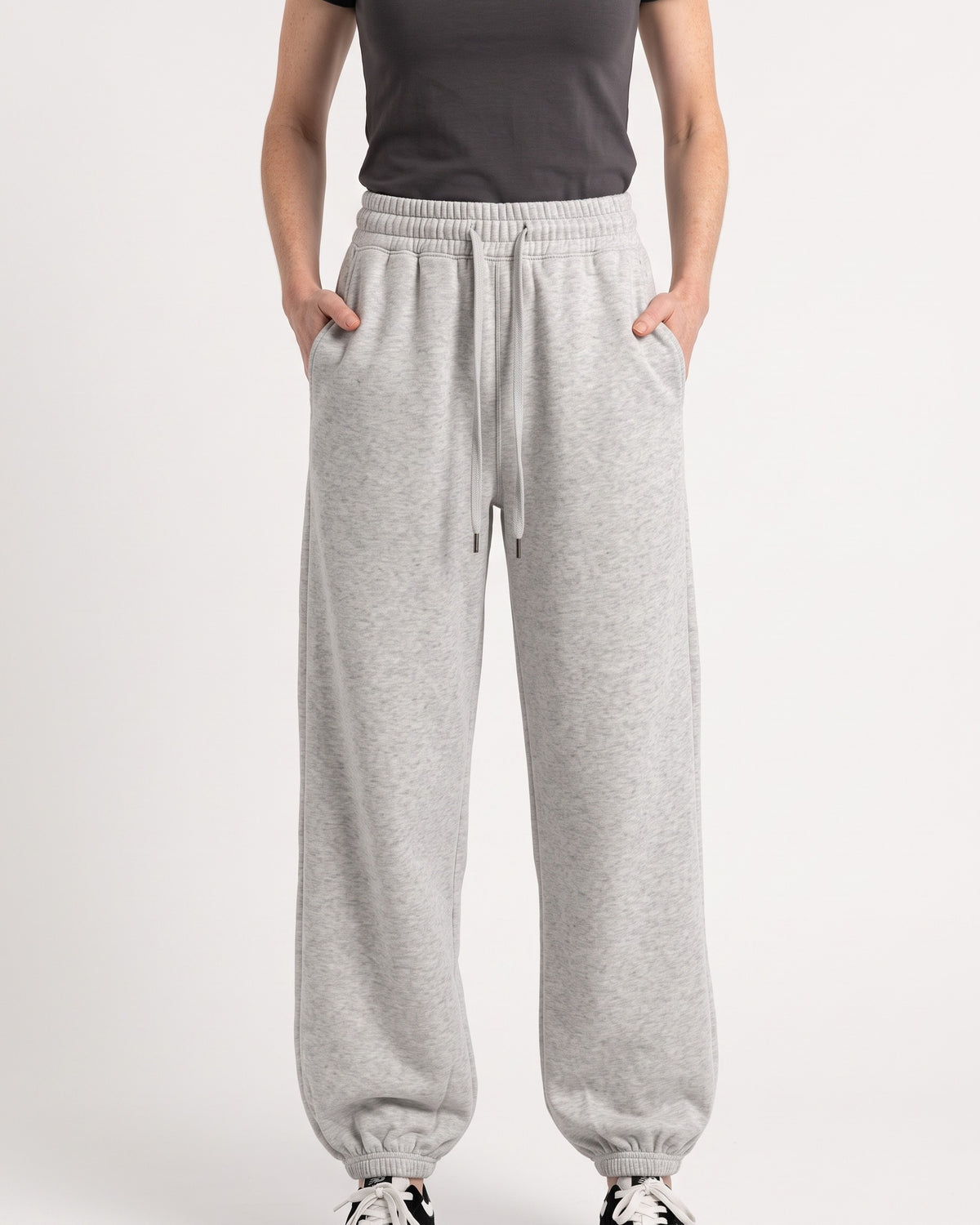 Heather gray fleece jogger sweatpants, high waist, drawstring, loose balloon fit, cuffed ankles