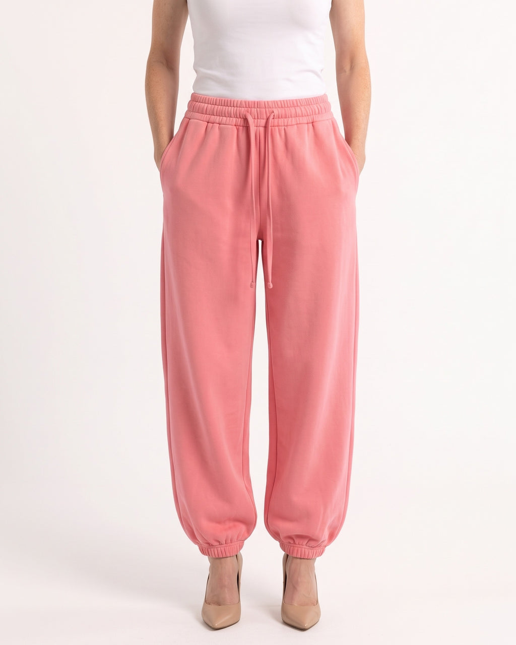 Women's high-waisted pink fleece jogger sweatpants, drawstring and cuffed balloon leg