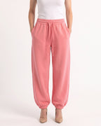 Women's high-waisted pink fleece jogger sweatpants, drawstring and cuffed balloon leg