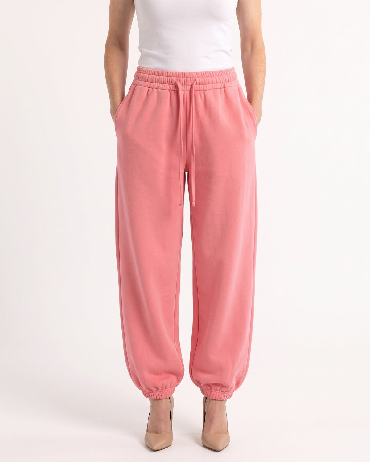 Women's high-waisted pink fleece jogger sweatpants, drawstring and cuffed balloon leg