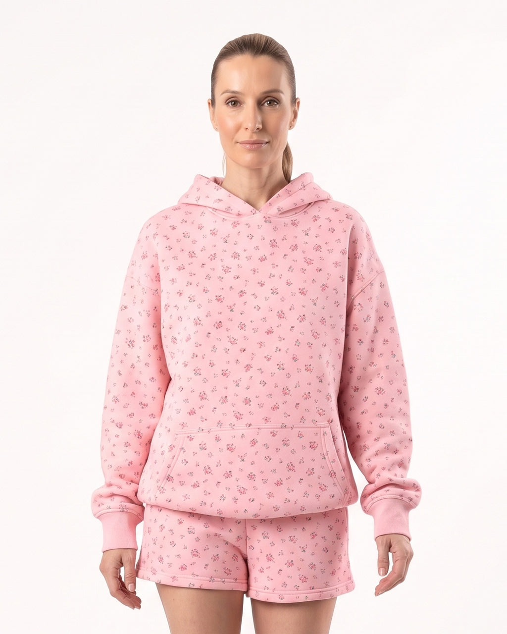 Women's pink floral fleece hoodie and shorts set with drawstring hood and relaxed fit