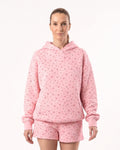 Women's pink floral fleece hoodie and shorts set with drawstring hood and relaxed fit