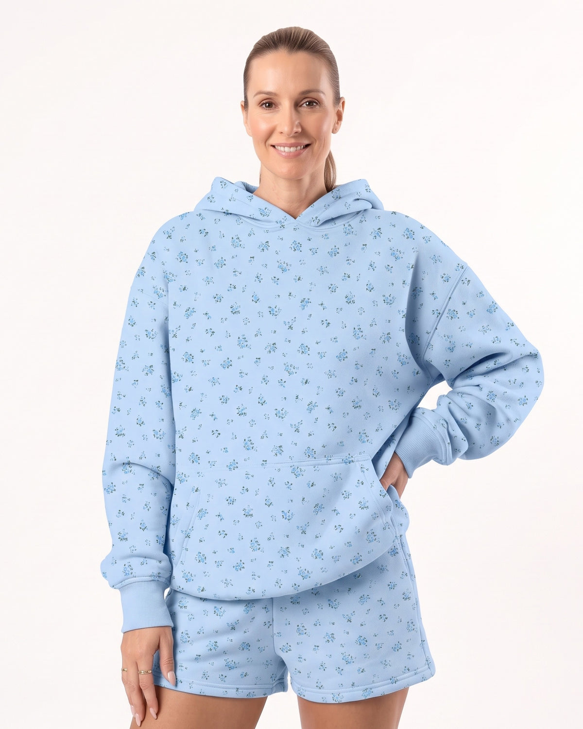 Women's sky blue floral fleece hoodie and shorts set with drawstring hood and relaxed fit