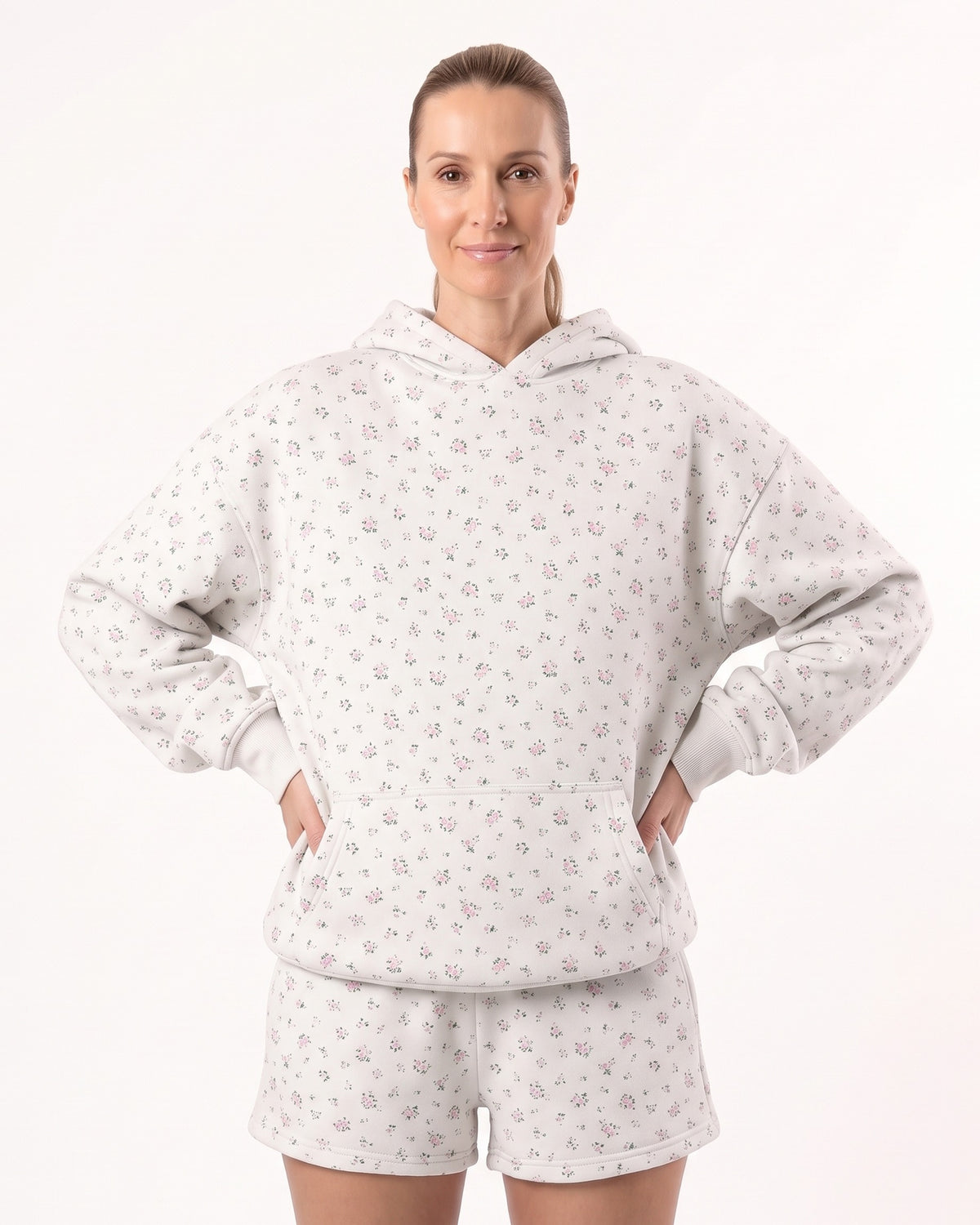 Women's white floral fleece hoodie and shorts set with drawstring hood and relaxed fit
