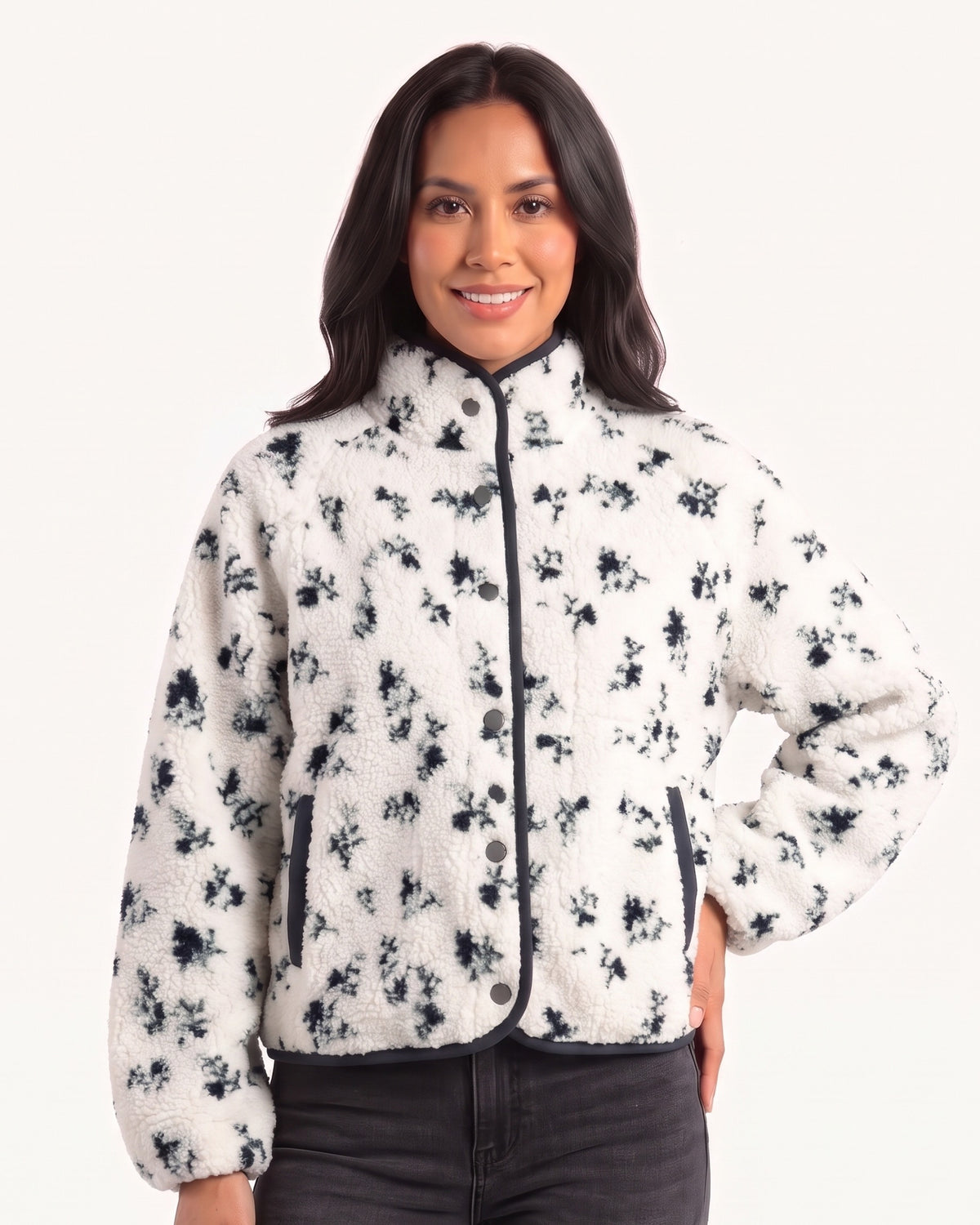 Women's cropped cream sherpa jacket with dark floral print, stand collar, snap buttons and piped trim