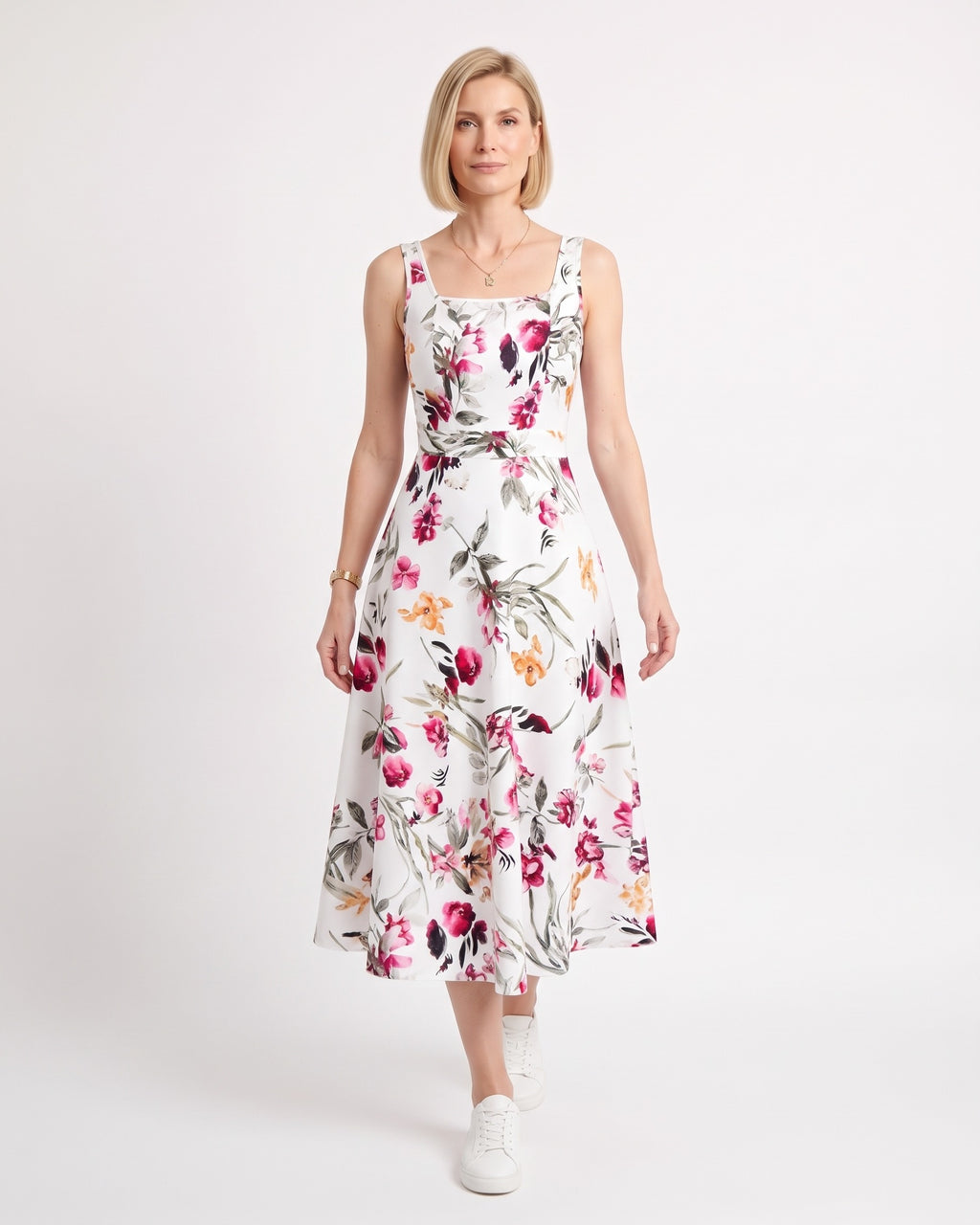 White floral midi dress with pink flowers, square neckline, wide straps and an A-line skirt