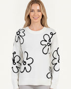 White crew neck sweater with black daisy embroidery, long sleeve pullover