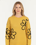 Yellow crew neck sweater with black daisy embroidery, long sleeve pullover