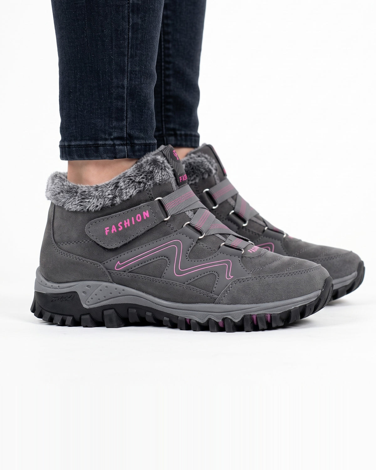 Women’s gray fur-lined snow boots with pink trim, hook-and-loop straps, lug sole