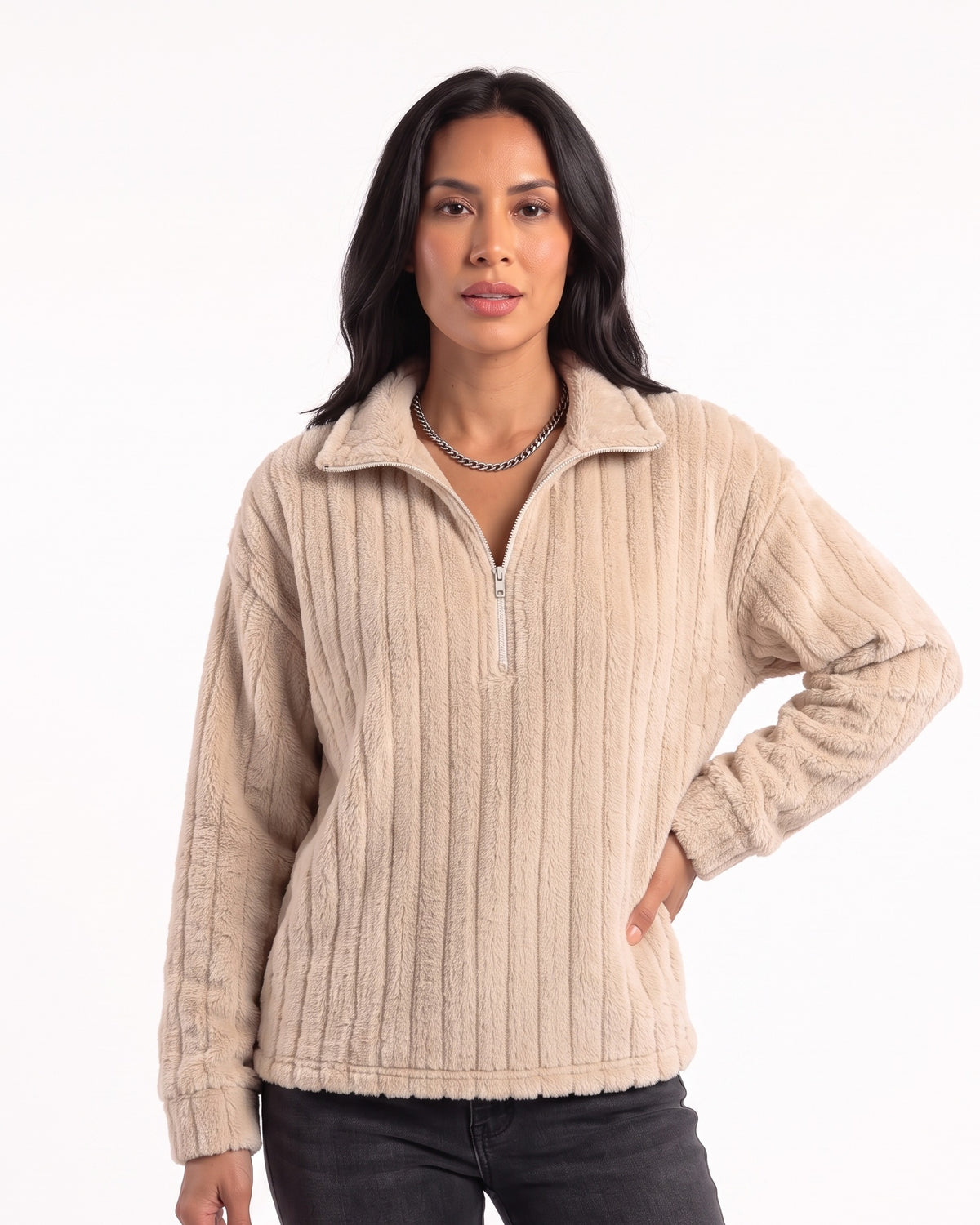 Beige fuzzy half-zip pullover with spread collar, ribbed plush fleece; worn with dark pants