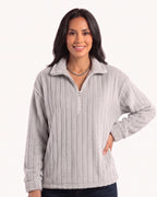 Light gray plush fleece half-zip pullover with spread collar and relaxed fit.