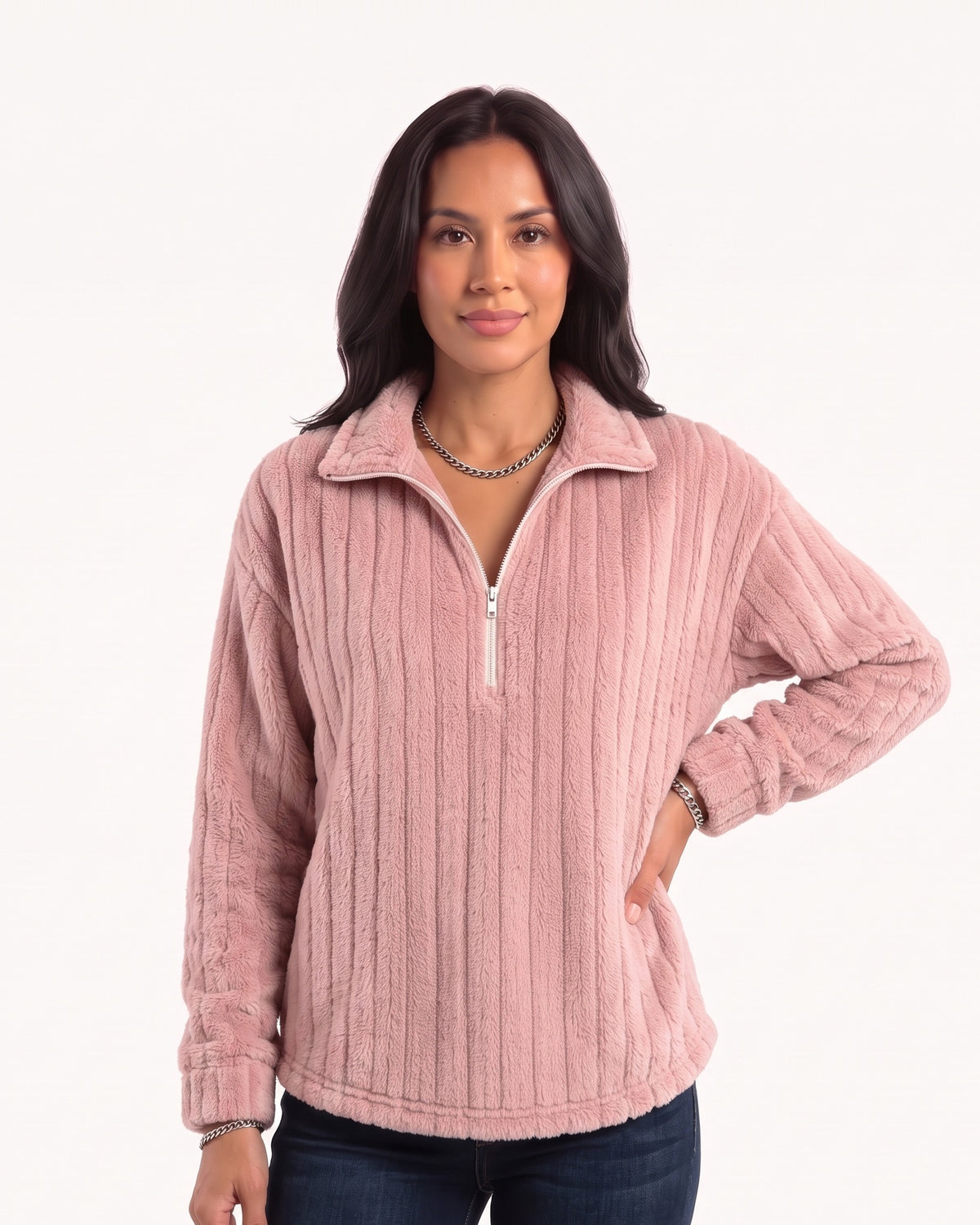 Pink fuzzy half-zip pullover with spread collar, ribbed plush fleece; worn with dark jeans