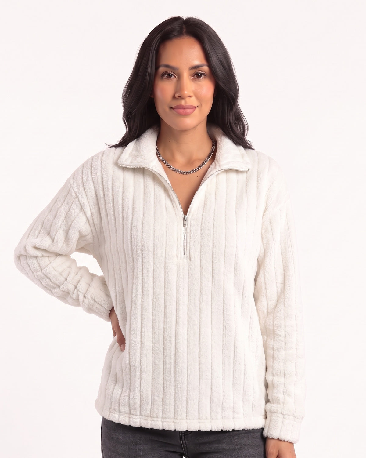 White plush fleece half-zip pullover with spread collar and ribbed texture.