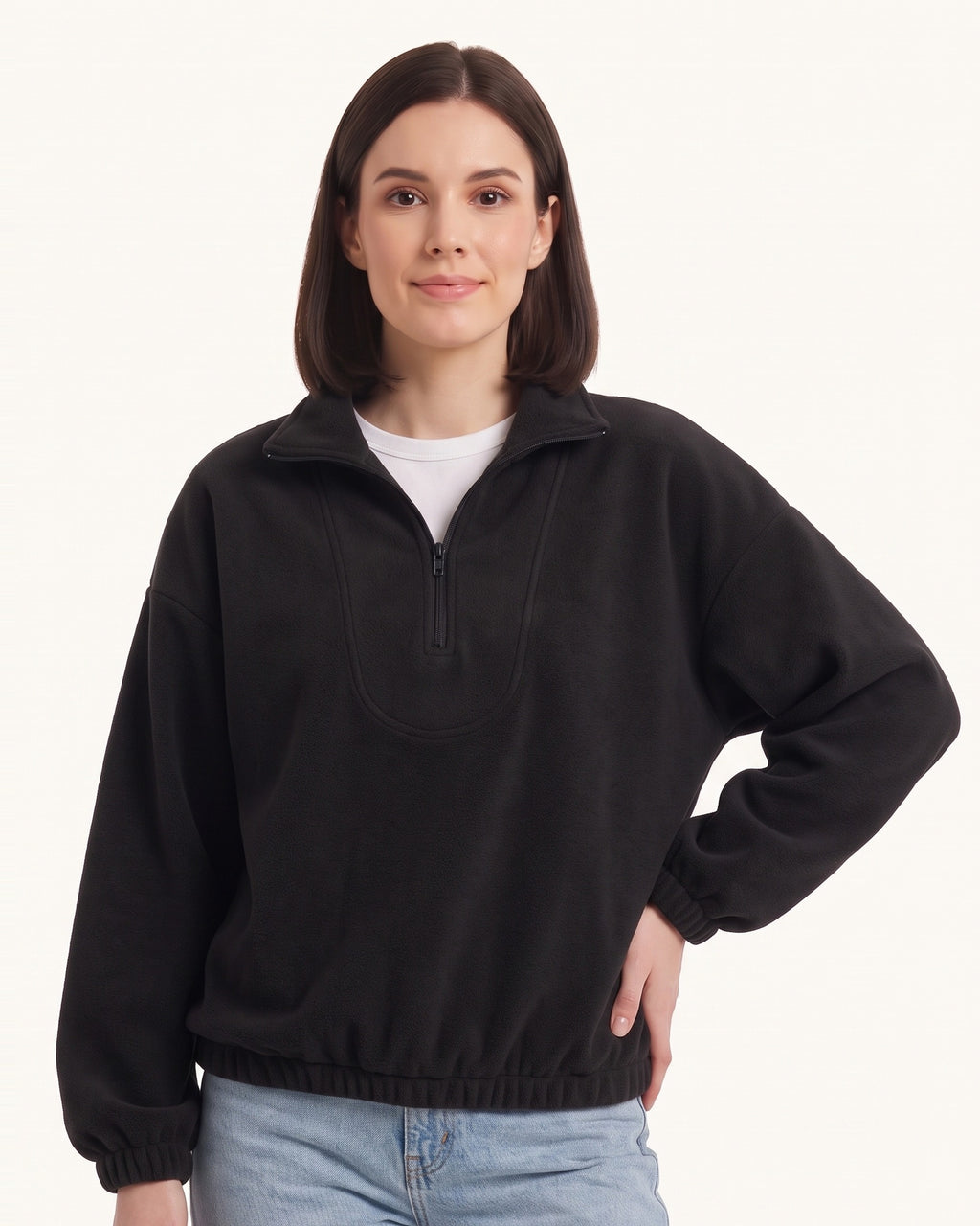 Black half-zip fleece pullover with oversized stand collar and long sleeves