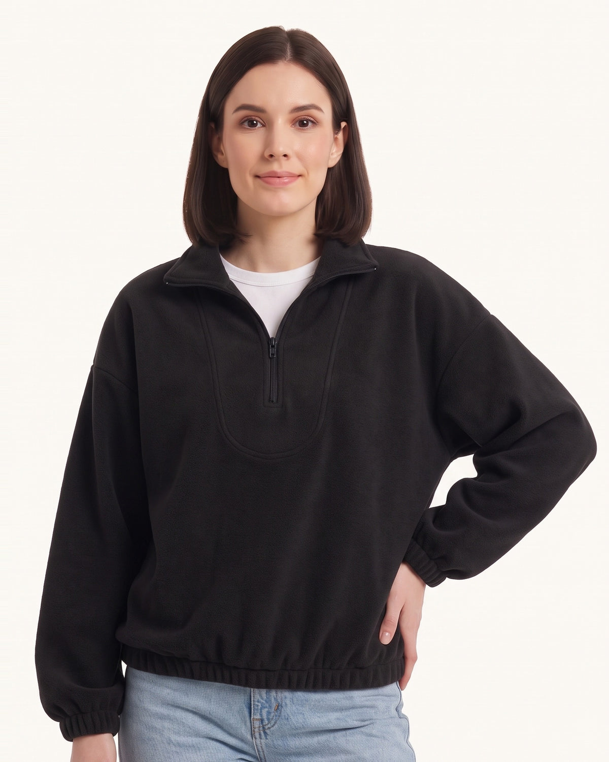 Black half-zip fleece pullover with oversized stand collar and long sleeves