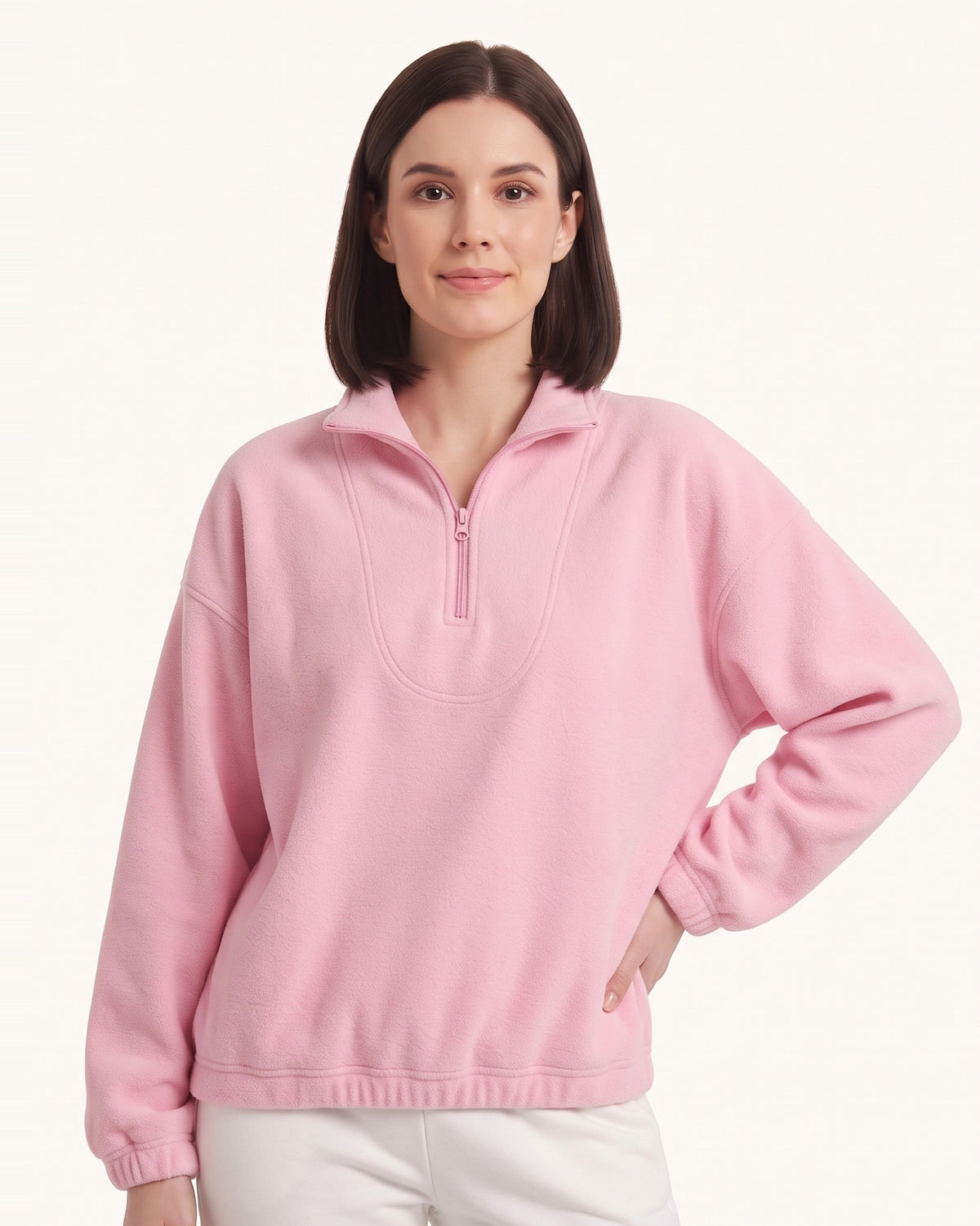 Pink half-zip fleece pullover with oversized stand collar and long sleeves