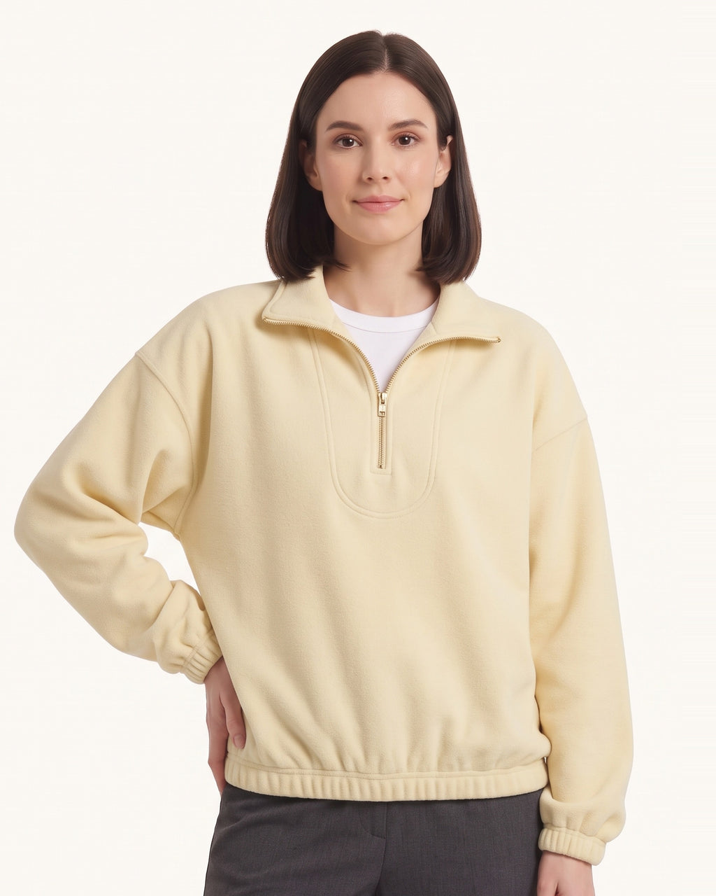 Cream yellow half-zip fleece pullover with oversized stand collar and long sleeves