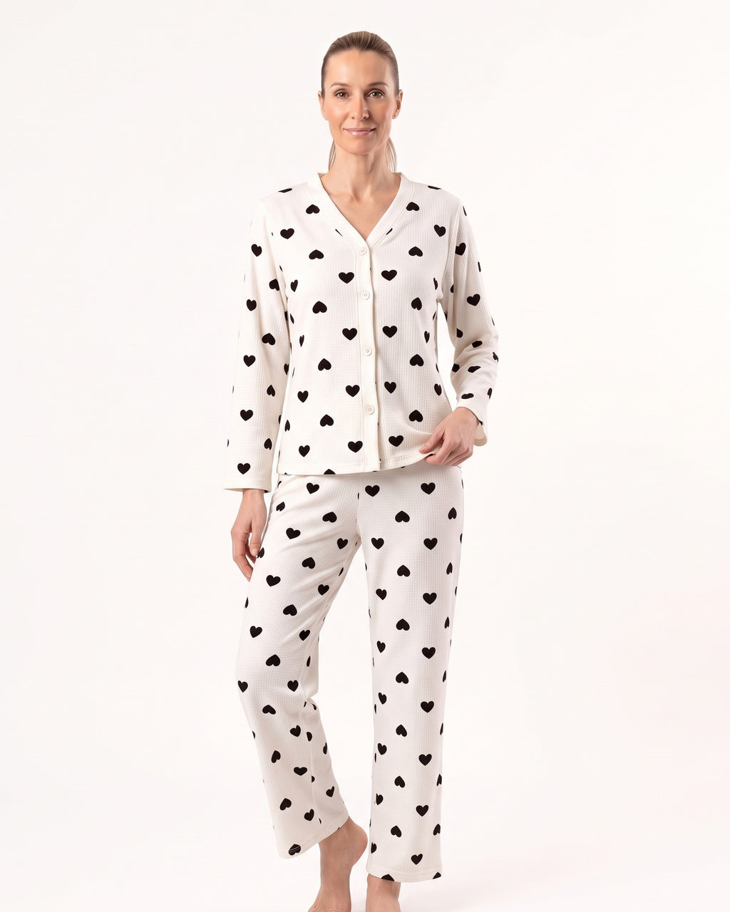 Women’s heart-print pajama set, white fabric with black hearts, long-sleeve top and matching pants