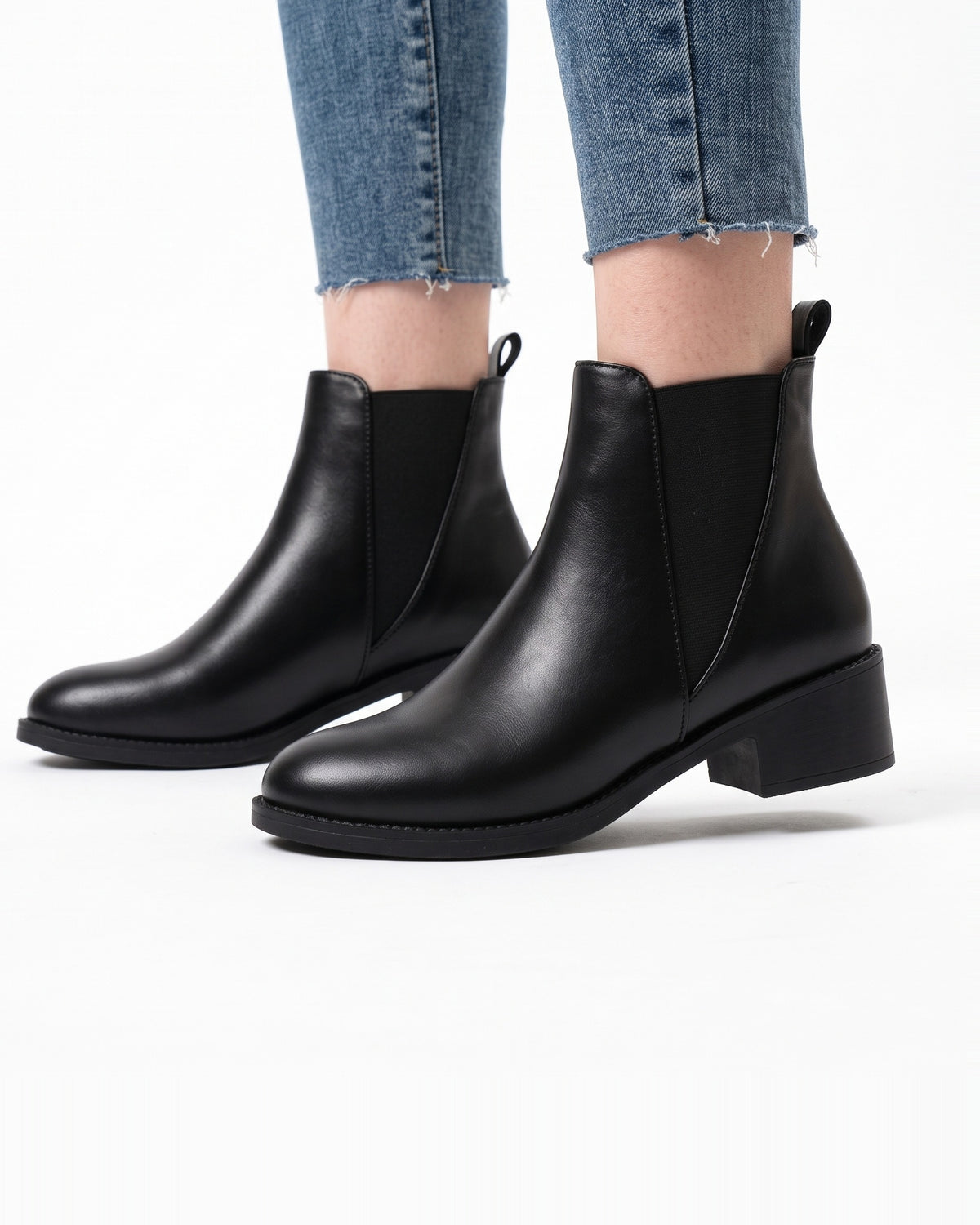 Black chelsea ankle boots with chunky block heel, round toe, pull-on style