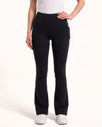 Black high-waist bootcut leggings with front seam and tapered-to-flare legs