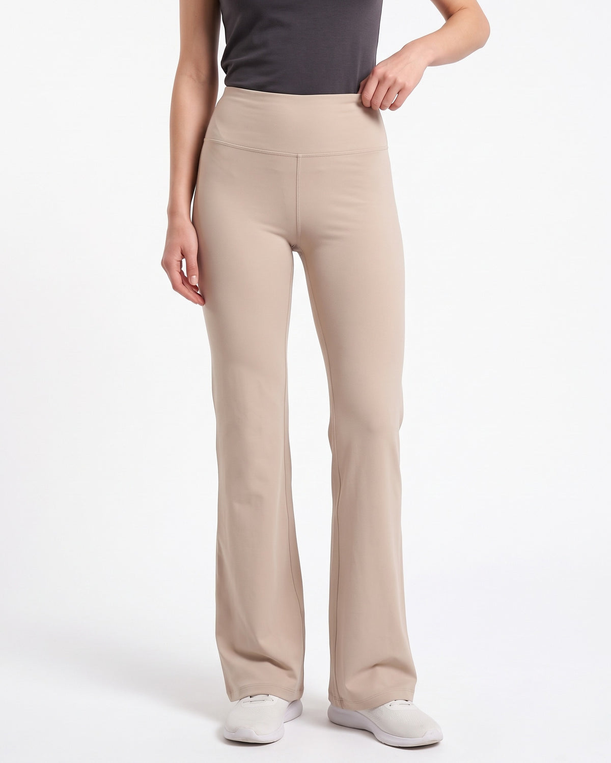 Women’s high-waisted flare leggings in beige, smooth fitted fabric
