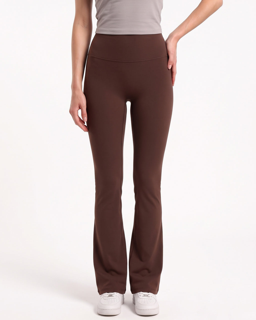 Women’s high-waisted flare leggings in dark brown, smooth fitted fabric