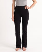High-waist black flare leggings with tummy-control waistband and contoured back seam
